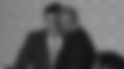 General manager Rod Graves receives his Tank Younger Award plaque from Cardinals team president Michael Bidwill Friday afternoon.