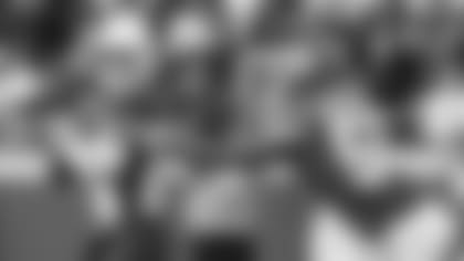 Cardinals QB Josh Rosen looks downfield for a target as Chiefs linebacker Justin Houston closes in during last week's game in Kansas City.