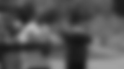 Quentin Harris (left) and Adrian Wilson watch a practice in 2019