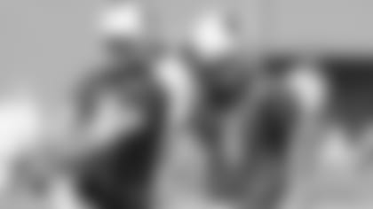 Rookie kicker Matt McCrane (right) with veteran Phil Dawson during offseason work