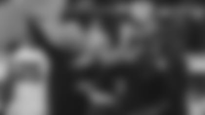 Defensive coordinator Vance Joseph (black shirt, right) calls out plays next to head coach Kliff Kingsbury (sunglasses) during a game in San Francisco earlier this season.