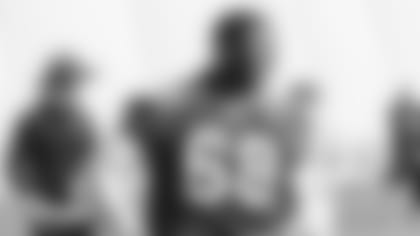 Kelvin Beachum smiles at a practice during the 2021 season.