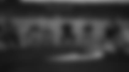 Jay Glazer addresses military vets about mental health as Cardinals offensive lineman Justin Pugh sits next to him during the MVP Kickoff Event Tuesday afternoon in the practice bubble at the Dignity Health Training Center.