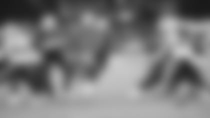 RB Kenyan Drake runs through a big hole against the Bills in a 2020 home game
