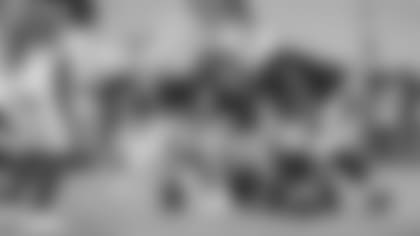 Mason Cole (52), here getting ready to snap the ball while playing center, has also gotten time at guard and tackle in camp.