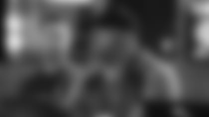 Cardinals GM Steve Keim (right) watches work at the recent NFL Scouting combine as coach Kliff Kingsbury talks to him.