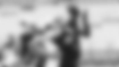 Wide receiver Larry Fitzgerald hauls in a deep pass during a recent training camp practice.