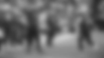 Injured running back James Conner (left) celebrates a touchdown from teammate Chase Edmonds Saturday night against the Colts.