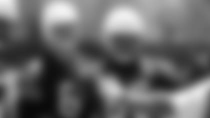 G J.R. Sweezy (left) and G/C Lamont Gaillard listen to instruction during offseason work.