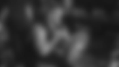 DL J.J. Watt lifts a barbell on the first day of voluntary workouts in 2022