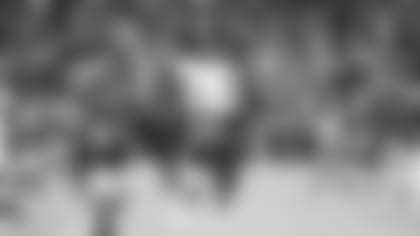 Cornerback Antonio Hamilton does a backflip in celebration of the Cardinals' win on Sunday over the Vikings.