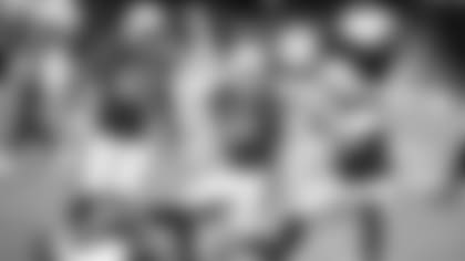 Linebacker Dennis Gardeck (45) celebrates with teammates Zach Allen (94) and Haason Reddick (43) after sacking Eagles quarterback Jalen Hurts in a game last month. Gardeck later suffered a torn ACL in the game.