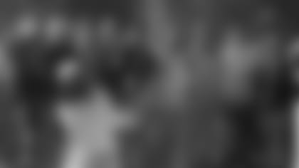 Cardinals wide receiver Larry Fitzgerald shoots from a bunker during the AT&T Pebble Beach Pro-Am, in which Fitzgerald and partner Kevin Streelman won the pro-am side Sunday.