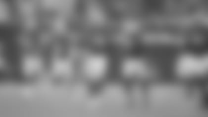 LB Jordan Hicks flips the football in the air after forcing and recovering a fumble in the first quarter Thursday against the Chargers.