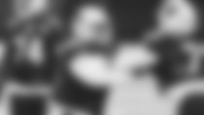 Center Rodney Hudson (61) runs a drill against fellow center Michal Menet during a recent practice.