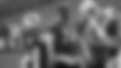 Left tackle D.J. Humphries (74), who has been sitting out practice, talks with wide receiver Rondale Moore at Tuesday's practice.