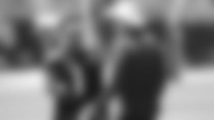 Cardinals QB Kyler Murray talks with coach Kliff Kingsbury during Wednesday's OTA.