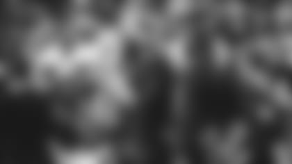 Defensive end J.J. Watt, here on the sideline before last weekend's game against the Seahawks, is hoping to return for the Cardinals' playoff game.