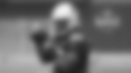 Cardinals offensive lineman Josh Allen does know how to spin the ball, maybe just not the same way as the potential No. 1 draft pick of the same name.