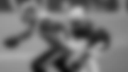 Cornerback Tramaine Brock tackles Rams tight end Tyler Higbee during the Cardinals' loss to the Rams Sunday.