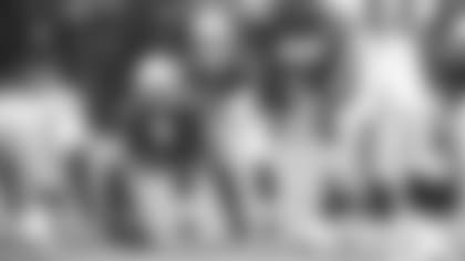 Quarterback Josh Rosen prepares to get the snap from center Daniel Munyer Saturday night.