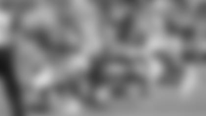 Cardinals Budda Baker (32), Jordan Hicks (58) and Michael Dogbe (91) swarm 49ers quarterback Jimmy Garoppolo during Sunday's game.