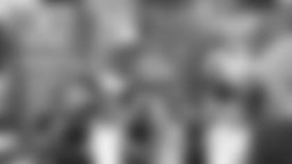 OLB Chandler Jones talks to Valencia Newcomer School students at an anti-bullying assembly on Tuesday morning