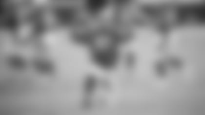 DE Cap Capi celebrates one of his sacks against the Chargers.