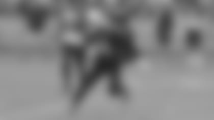 Wide receiver Trent Sherfield runs after the catch during Friday's practice.