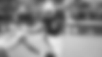 TE Maxx Williams runs after the catch in overtime against the Lions.