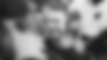 Coach Kliff Kingsbury smiles during the Cardinals' 31-5 win over the Texans on Sunday.