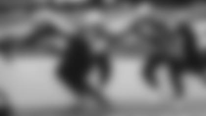 Defensive linemen Zach Allen (97) and Michael Dogbe (91) go through a drill during Saturday's training camp practice.