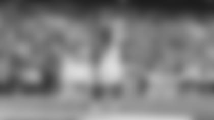 Defensive lineman Michael Dogbe (91), safety Budda Baker (3) and linebacker Isaiah Simmons celebrate during the Cardinals' win in Cleveland earlier this season.