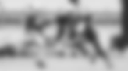 Wide receiver A.J. Green goes out for a pass during Thursday's practice against cornerback Byron Murphy.