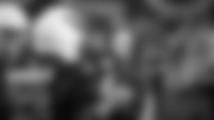 Coach Kliff Kingsbury talks to his players on the sideline during Thursday night's game against the 49ers.