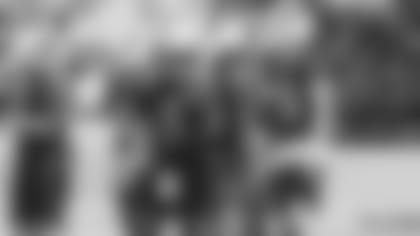 Quarterback Kyler Murray (1) talks to wide receiver DeAndre Hopkins (10) at a recent minicamp practice.