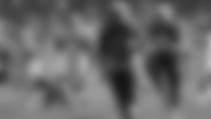 Los Angeles Chargers wide receiver Keenan Allen, center, runs for a touchdown after recovering a loose ball from running back Melvin Gordon, below, left, during the first half of an NFL football game against the Oakland Raiders, Sunday, Dec. 31, 2017, in Carson, Calif. (AP Photo/Alex Gallardo)