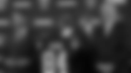 Oakland Raiders wide receiver Antonio Brown, center, holds his jersey beside coach Jon Gruden, left, and general manager Mike Mayock during an NFL football news conference Wednesday, March 13, 2019, in Alameda, Calif. (AP Photo/Ben Margot)