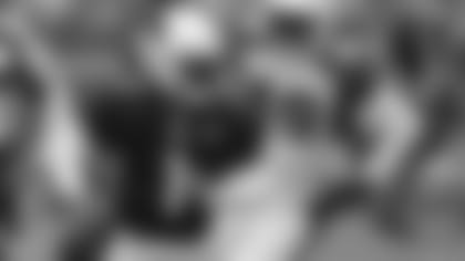 Arizona Cardinals' Kyler Murray (1) evades the rush during an NFL football training camp scrimmage, Saturday, Aug. 3, 2019, in Glendale, Ariz. (AP Photo/Matt York)