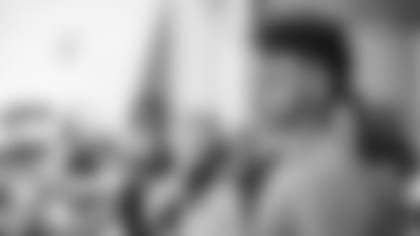 Players and Coach Reid address the media after arriving at training camp