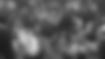 Kansas City Chiefs center Tim Grunhard (61) snaps the ball to Kansas City Chiefs quarterback Steve Bono (13) during the Nov. 24 1996 home game against the San Diego Chargers. The Chiefs lost 14-28.