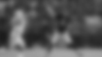 Baltimore Ravens quarterback Joe Flacco (5) throws a pass under pressure from Indianapolis Colts defensive tackle Grover Stewart (90) during an NFL football game in Baltimore on Saturday, Dec. 23, 2017. The Ravens defeated the Colts 23-16. (Kirby Lee via AP)