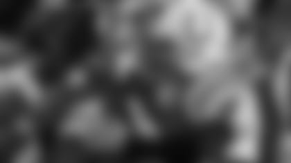 Indianapolis Colts head coach Tony Dungy hugs Colts kicker Adam Vinatieri (4) seconds before the end of the game against the Chicago Bears at the Super Bowl XLI football game at Dolphin Stadium in Miami on Sunday, Feb. 4, 2007. The Colts defeated the Bears 29-17. (AP Photo/Mark J. Terrill)