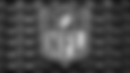 An NFL logo is displayed at the opening of "NFL Experience" in Times Square, New York, Thursday, Nov. 30, 2017. (AP Photo/Seth Wenig)