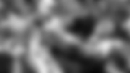 Indianapolis Colts' Andrew Luck (12) is hit by Philadelphia Eagles' Derek Barnett (96) during the second half of an NFL football game, Sunday, Sept. 23, 2018, in Philadelphia. (AP Photo/Matt Rourke)