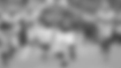 Indianapolis Colts quarterback Andrew Luck (12) scrambles away from San Francisco 49ers linebacker Dekoda Watson (97), defensive end Arik Armstead (91) and defensive end Cassius Marsh (54) in the first half of an NFL preseason football game in Indianapolis, Saturday, Aug. 25, 2018. (AP Photo/AJ Mast)