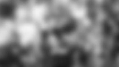 Chase Young encourages the defense during the Washington Football Team's game against the New Orleans Saints. (Emilee Fails/Washington Football Team)