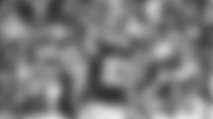 John Bates points to the line of scrimmage during the Washington Football Team's game against the Tampa Bay Buccaneers. (Karlee Sell/Washington Football Team)