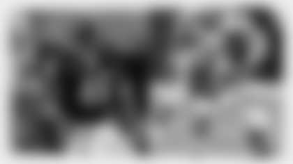 Carolina Panthers guard Travelle Wharton (70) lines up in a two-point stance during an NFL game against the Indianapolis Colts on November 27, 2011. The Panthers defeated the Colts 27-19. (AP Photo/Kevin Terrell) Chicago Bears safety Chris Harris follows the action against the New Orleans Saints during the NFC Championship football game, Sunday, Jan. 21, 2007, in Chicago. The Indianapolis Colts face the Chicago Bears in Super Bowl XLI in Miami on Sunday, Feb. 4, 2007. (AP Photo/Nam Y. Huh)