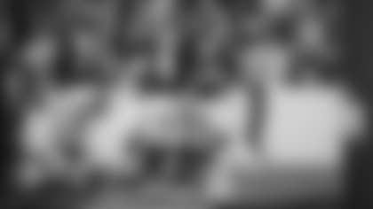 Taylor Heinicke celebrates with Antonio Gibson after Gibson scores his second touchdown of the Washington Football Team's game against the Tampa Bay Buccaneers. (Emilee Fails/Washington Football Team)